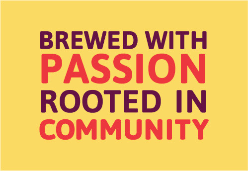 Sign that says "Brewed with passion, rooted in community."