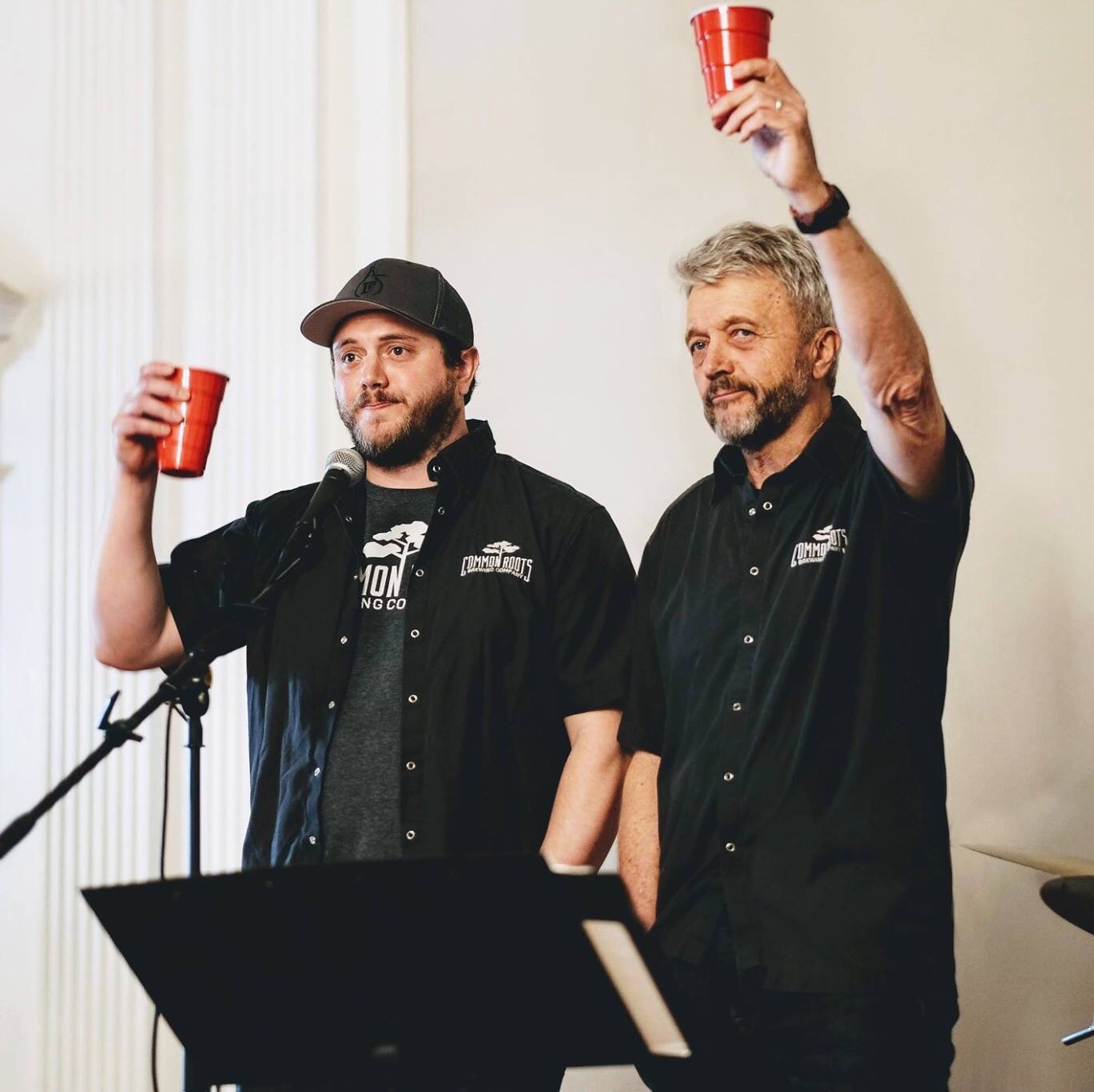 Christian and Bert Humbled holding up a cup