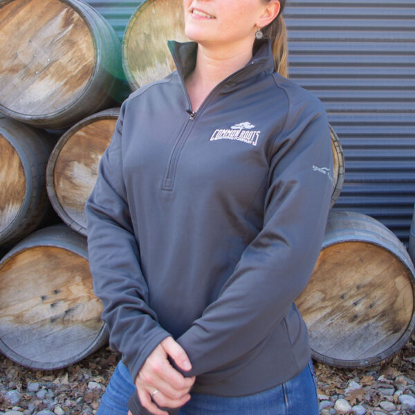 Gray Eddie Bauer fleece with common roots logo in white stitching