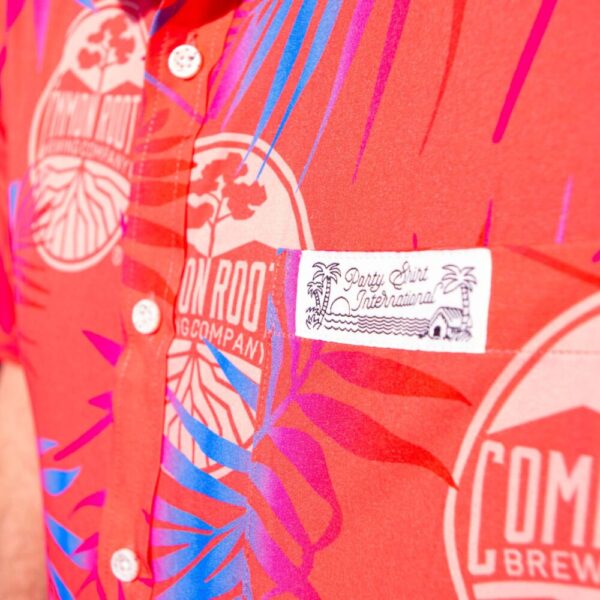 Close-up of party shirt showing "Party Shirt International" patch