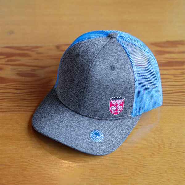 Gray and blue trucker hat with red Fat Bike Rally patch on one side