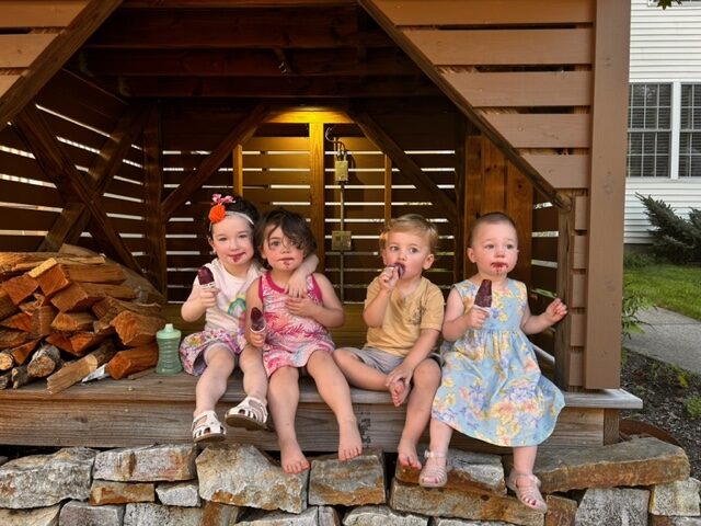 Cute little kids eating ice cream