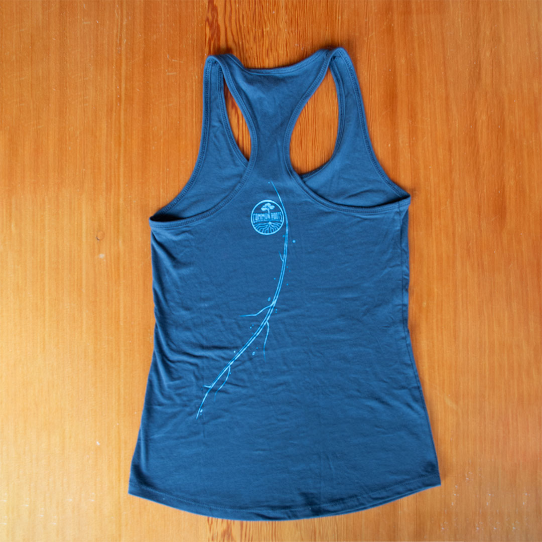 Back of blue racer-back tank top with common roots logo and vine