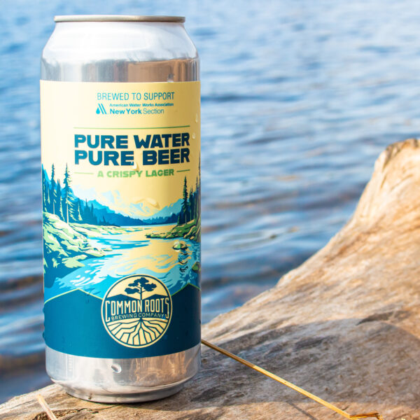 can of pure water, pure beer next to a river