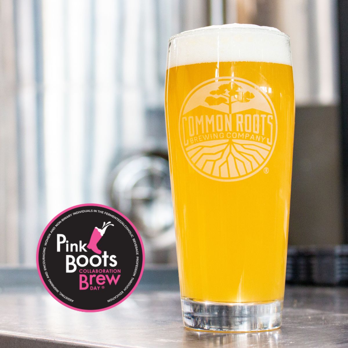 filled pint glass with Pink Boots Logo