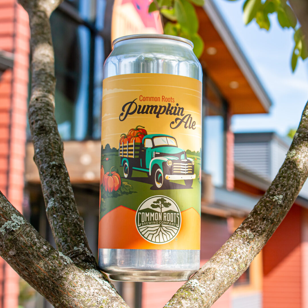Can of Pumpkin Ale infront of the Flagship Taproom