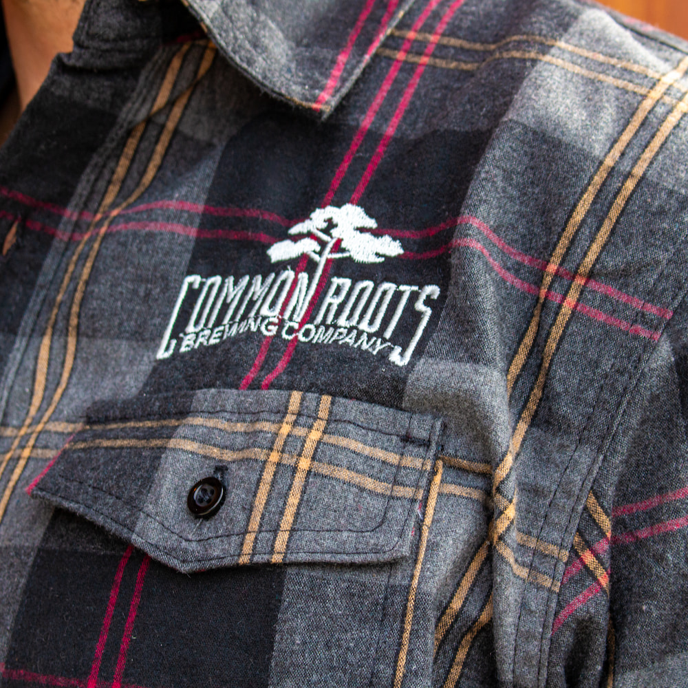 close up of embroidered CRBC logo on flannel