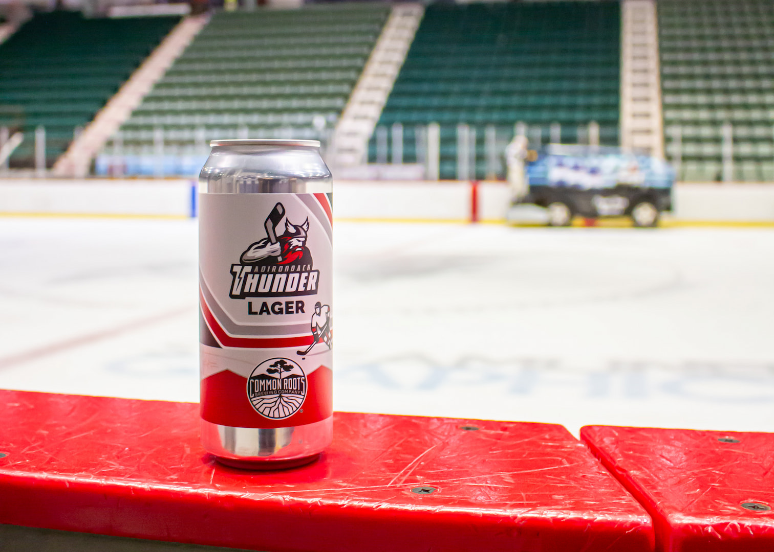 Can of Thunder Lager overlooking the ice at Harding Mazotti Arena